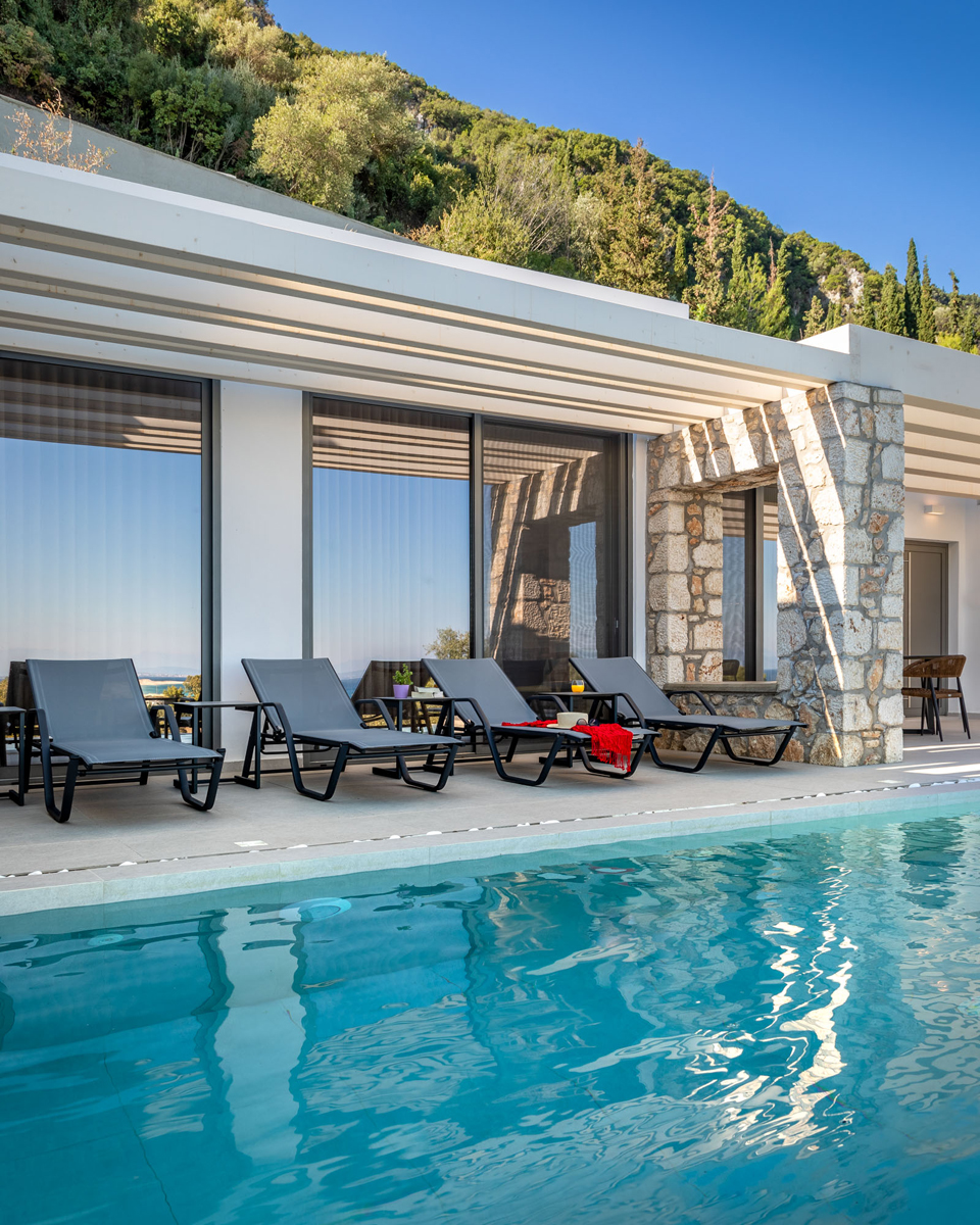 z luxury villa delta lefkada grecce swimming pool beach chairs sun mountain trees
